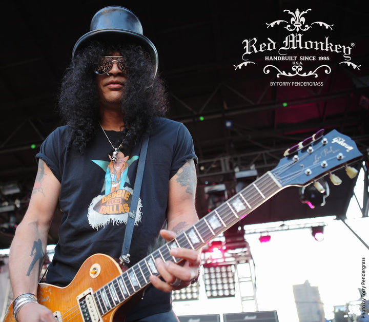 Slash at the Sunset Strip music festival hanging his Gibson Les Paul by his Red Monkey guitar strap. Photo credit by Torry Pendergrass