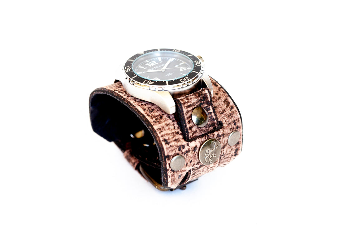 distressed leather cuff watch with diver watch face by Red Monkey