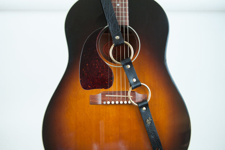 Jerry Cantrell leather guitar strap works great with Acoustic guitars as well.