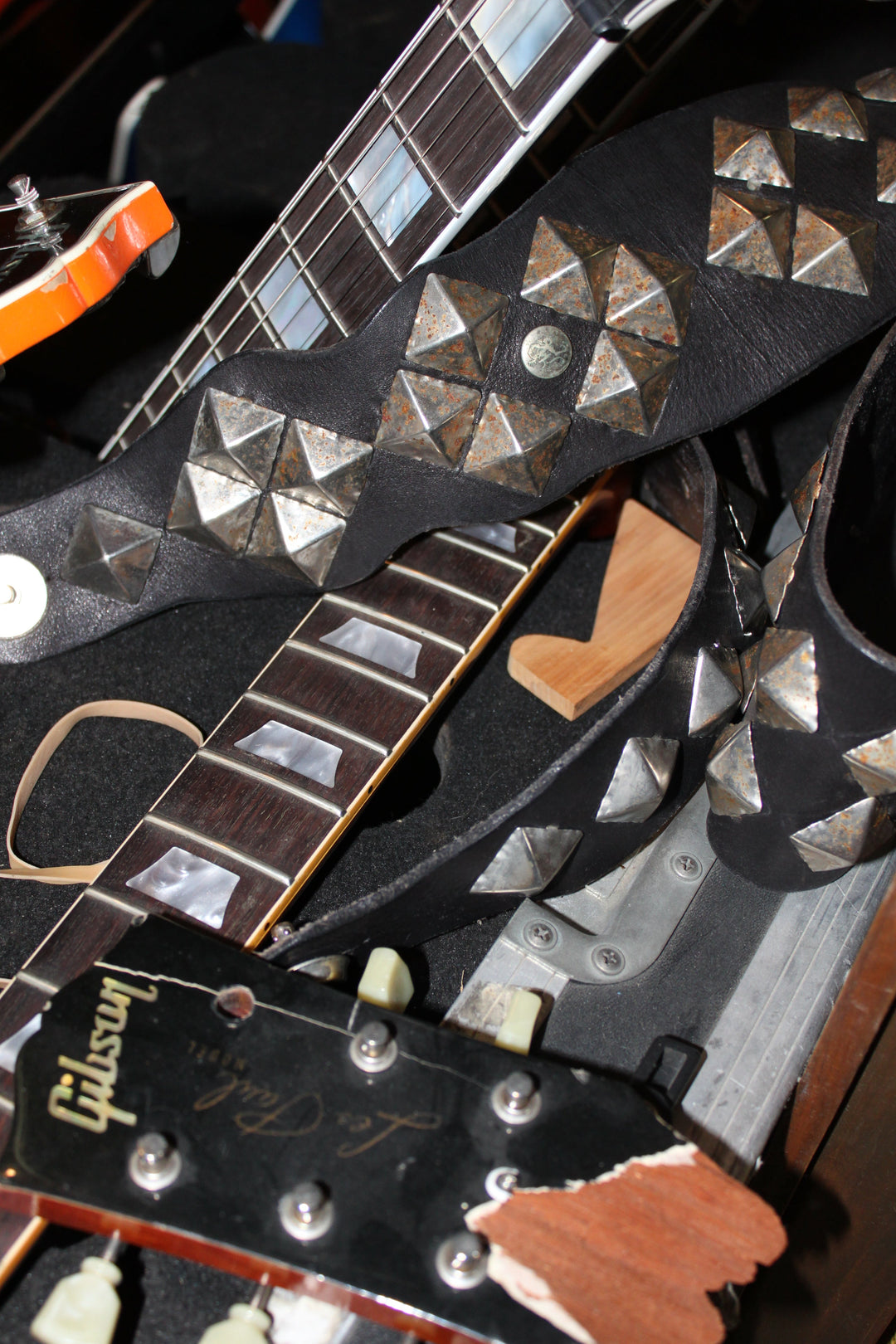 Stage-worn Red Monkey full-grain leather guitar strap that outlasted a Gibson guitar with a broken headstock