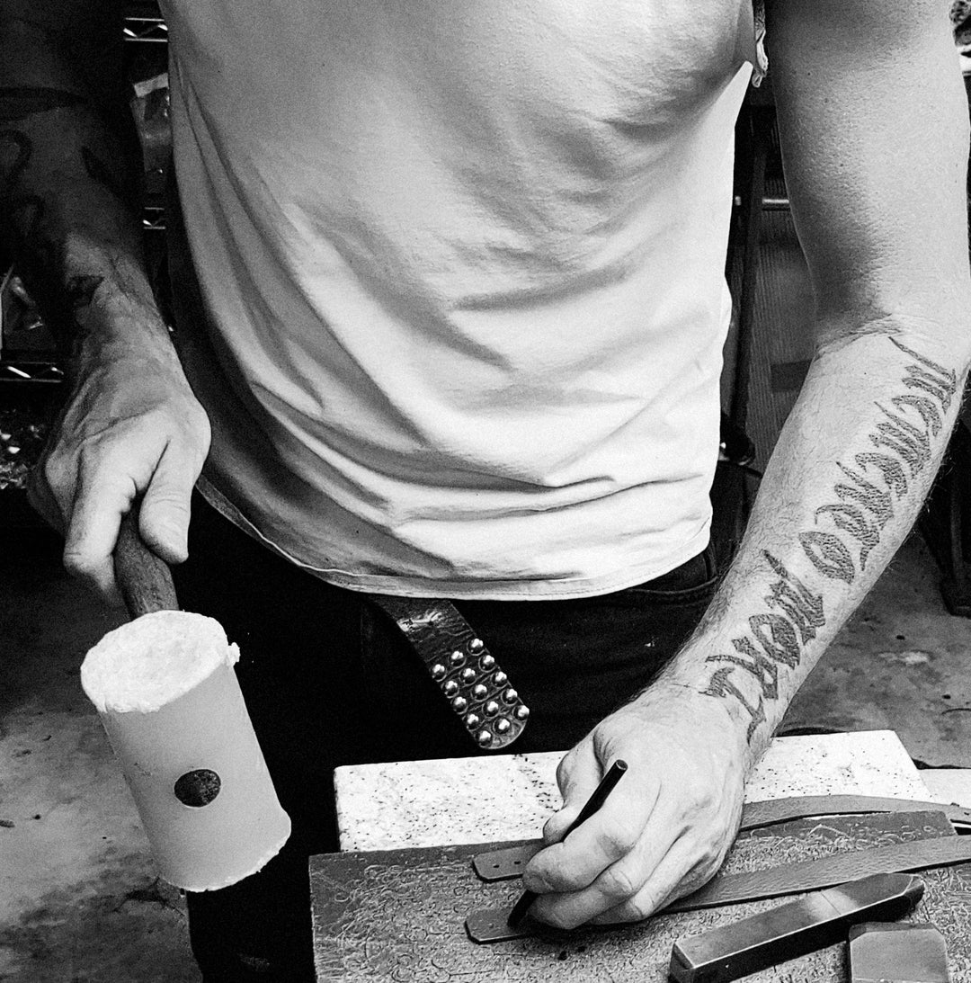 Torry Pendergrass hand-building leather guitar straps in the Red Monkey workshop in Los Angeles