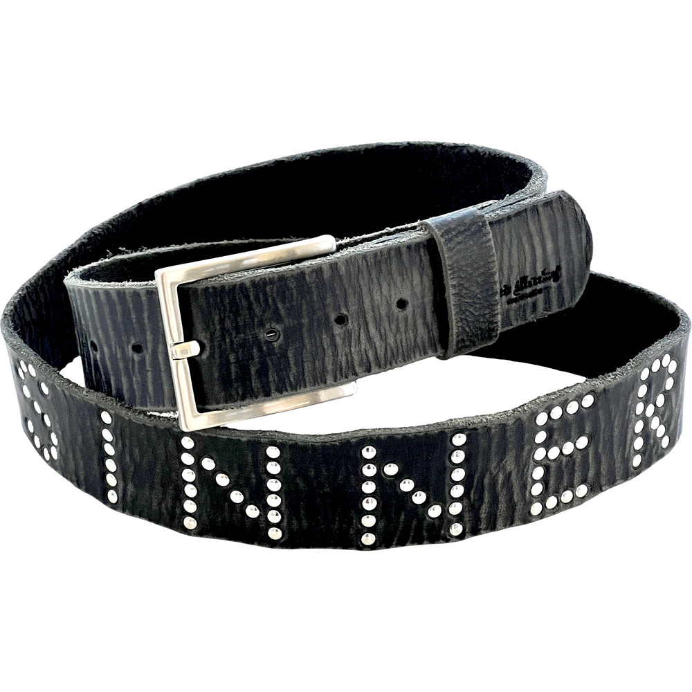 Sinner Studded Belt shown at an angle with distressed black leather and solid brass buckle