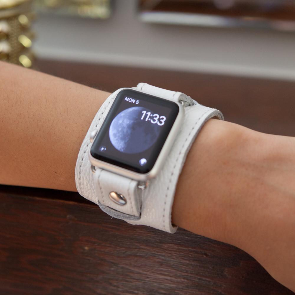 Unisex Apple Watch cuff styles in white leather.
