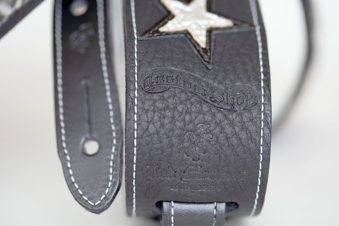 Cool leather custom guitar strap hand-made by Red Monkey