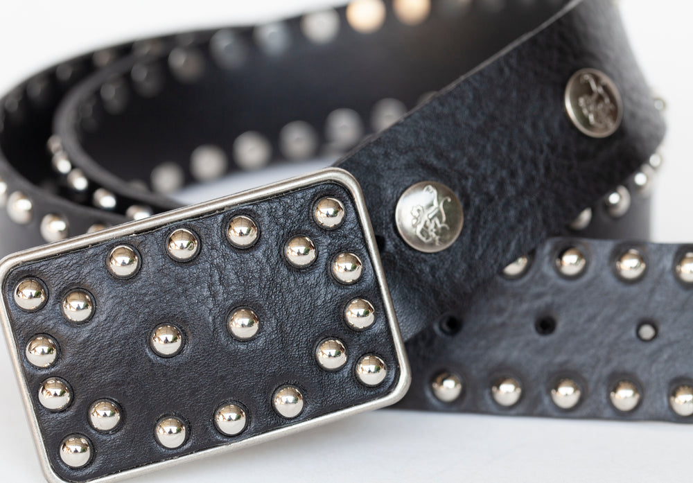 Close-up of Too Fast For You Belt with hand-built signature buckle and leather detail