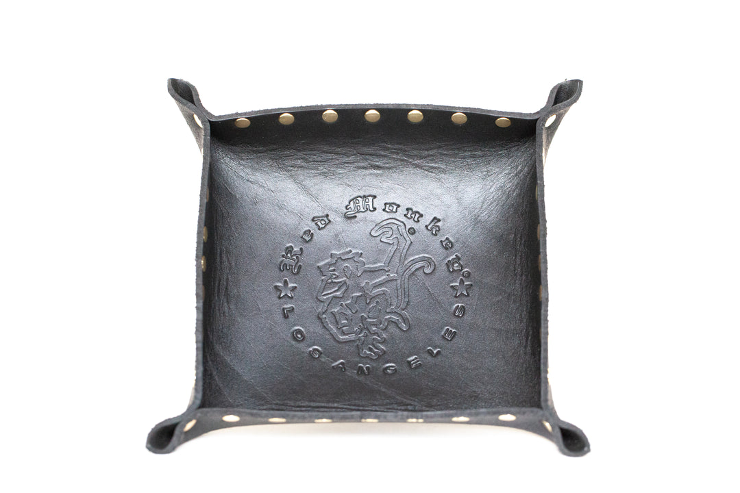 Black leather studded valet tray by Red Monkey.